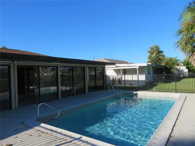 a view of a balcony with a pot