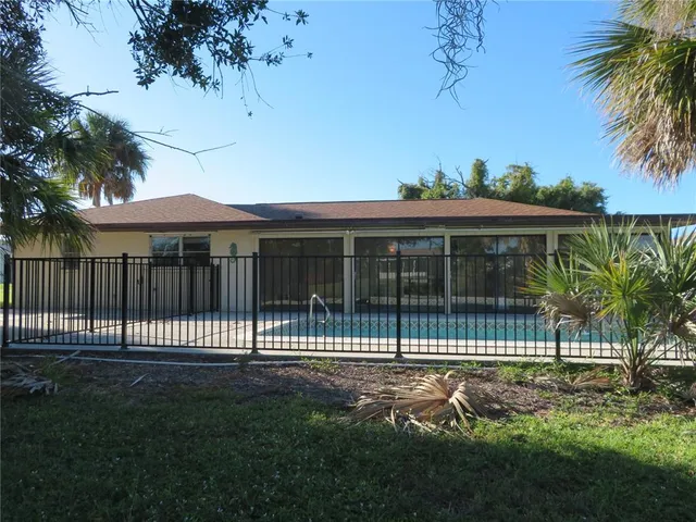 a house view with a backyard space