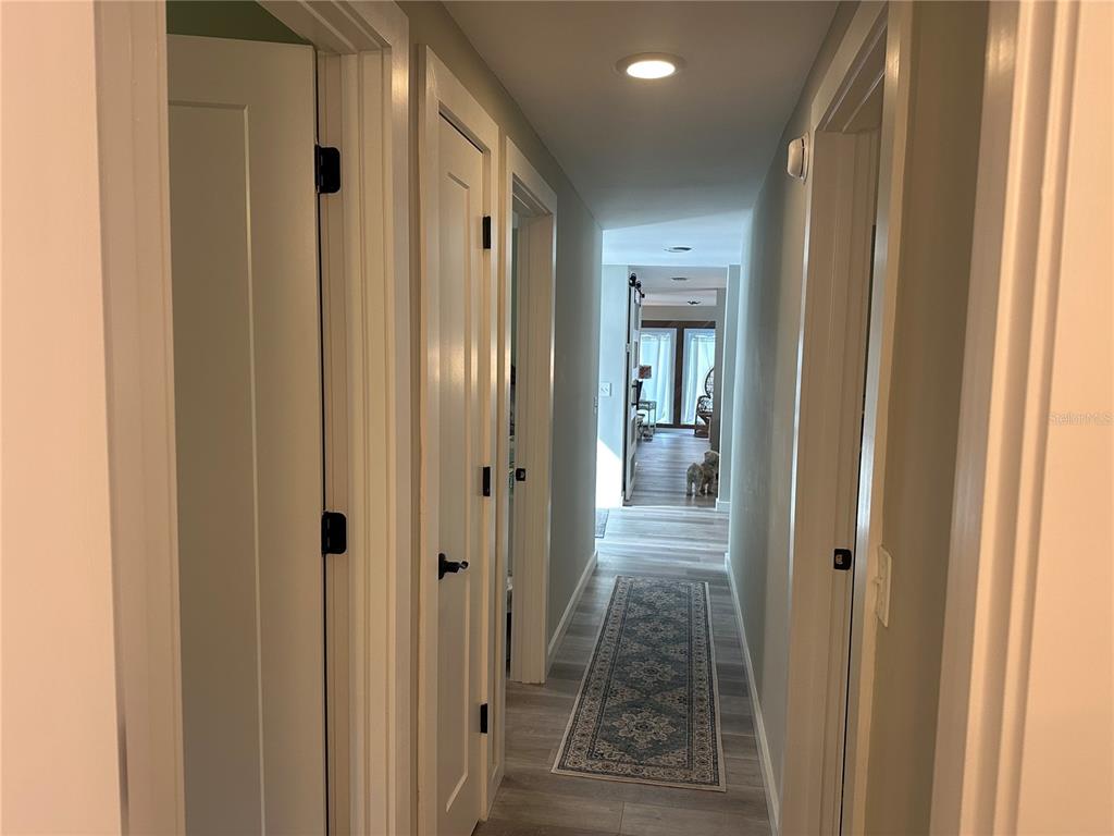 9781 West Halls River Road Homosassa, FL 34448 - Photo 19 of 59 a view of a bathroom from a hallway