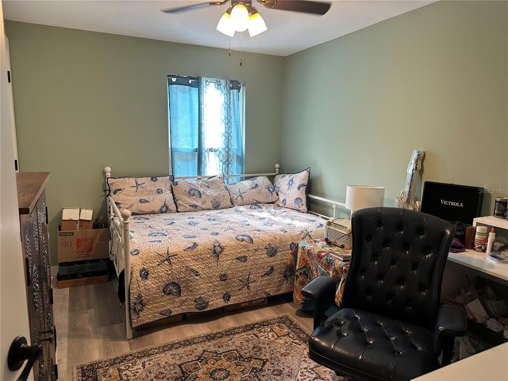 9781 West Halls River Road Homosassa, FL 34448 - Photo 20 of 59 a bedroom with a bed and a television