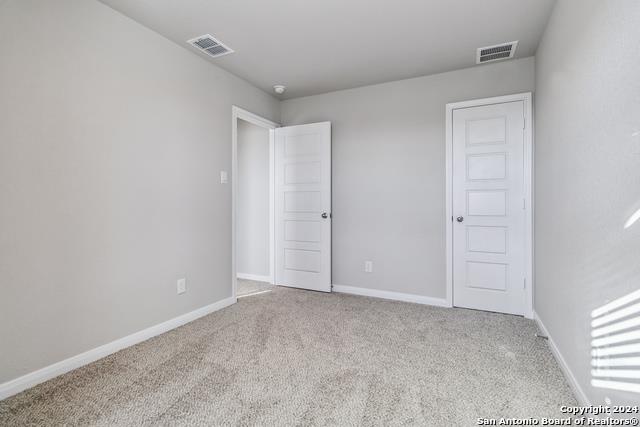 3921 Abbott Pass, Unit 102 St. Hedwig, TX 78152 - Photo 11 of 17 a view of an empty room