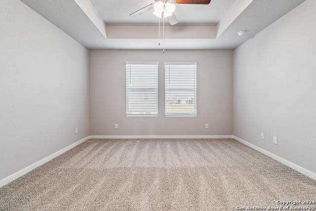 3921 Abbott Pass, Unit 102 St. Hedwig, TX 78152 - Photo 13 of 17 an empty room with a window