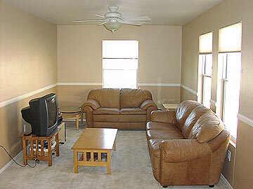 4009 West Carter Road Phoenix, AZ 85041 - Photo 5 of 6 a living room with furniture and a window