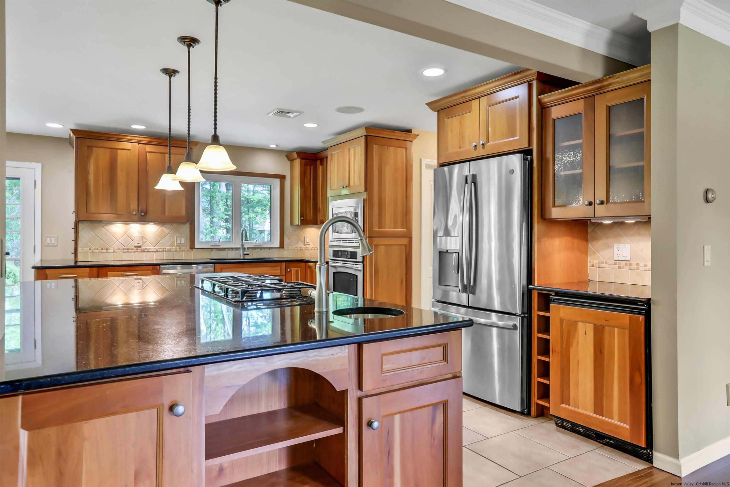 1 High Ridge Road, Unit KLEINKILL DR New Paltz, NY 12561 - Photo 17 of 30 a kitchen with stainless steel appliances granite countertop a refrigerator and a sink