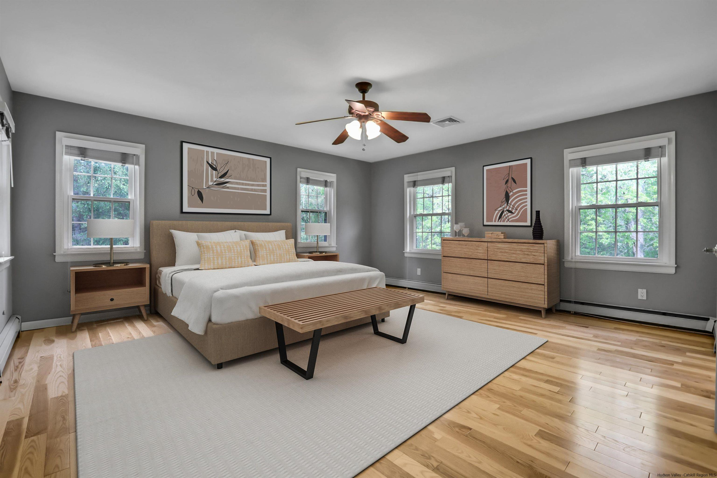 1 High Ridge Road, Unit KLEINKILL DR New Paltz, NY 12561 - Photo 20 of 30 a spacious bedroom with a bed chandelier and window