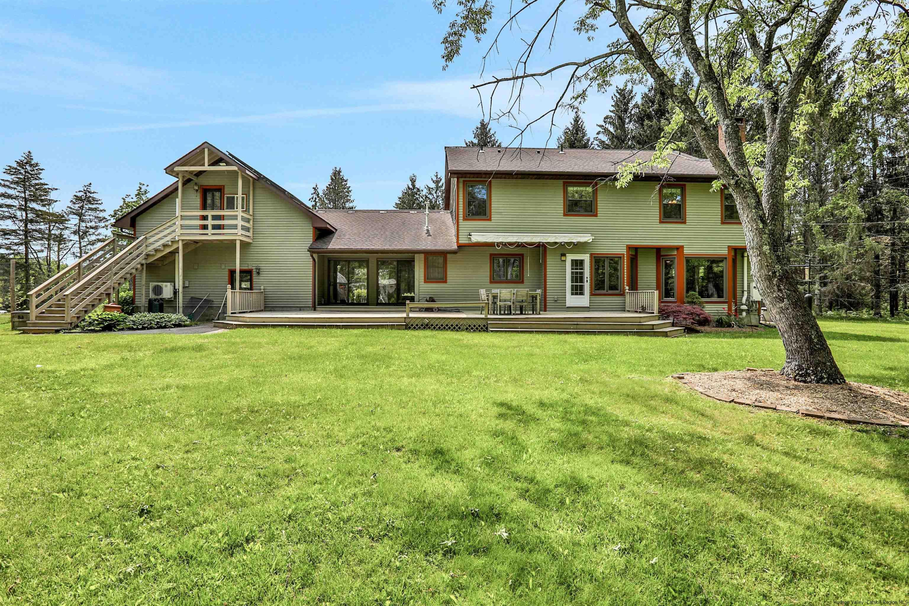 1 High Ridge Road, Unit KLEINKILL DR New Paltz, NY 12561 - Photo 27 of 30 a front view of a house with a yard and trees