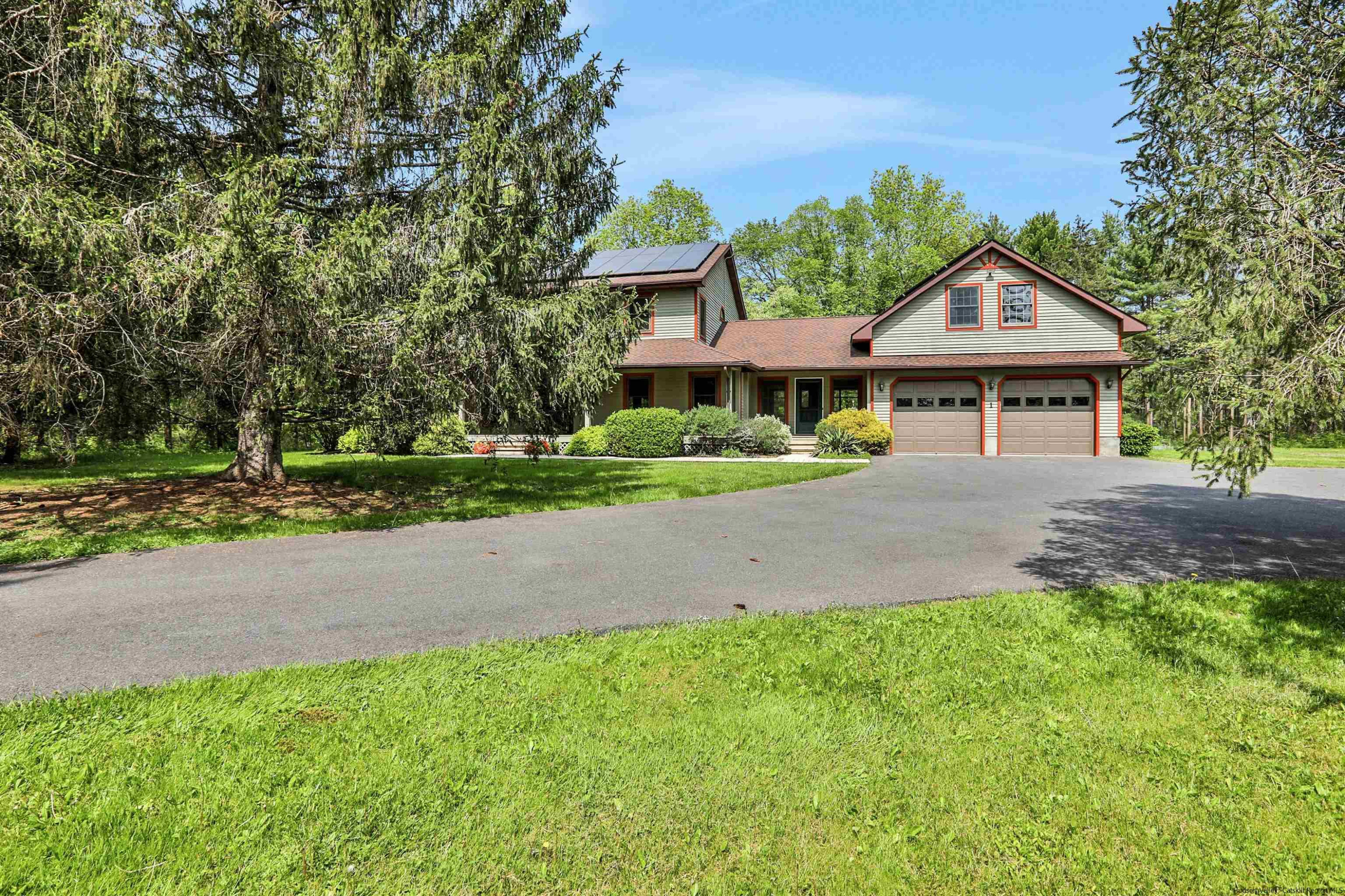 1 High Ridge Road, Unit KLEINKILL DR New Paltz, NY 12561 - Photo 29 of 30 a front view of a house with a yard and trees