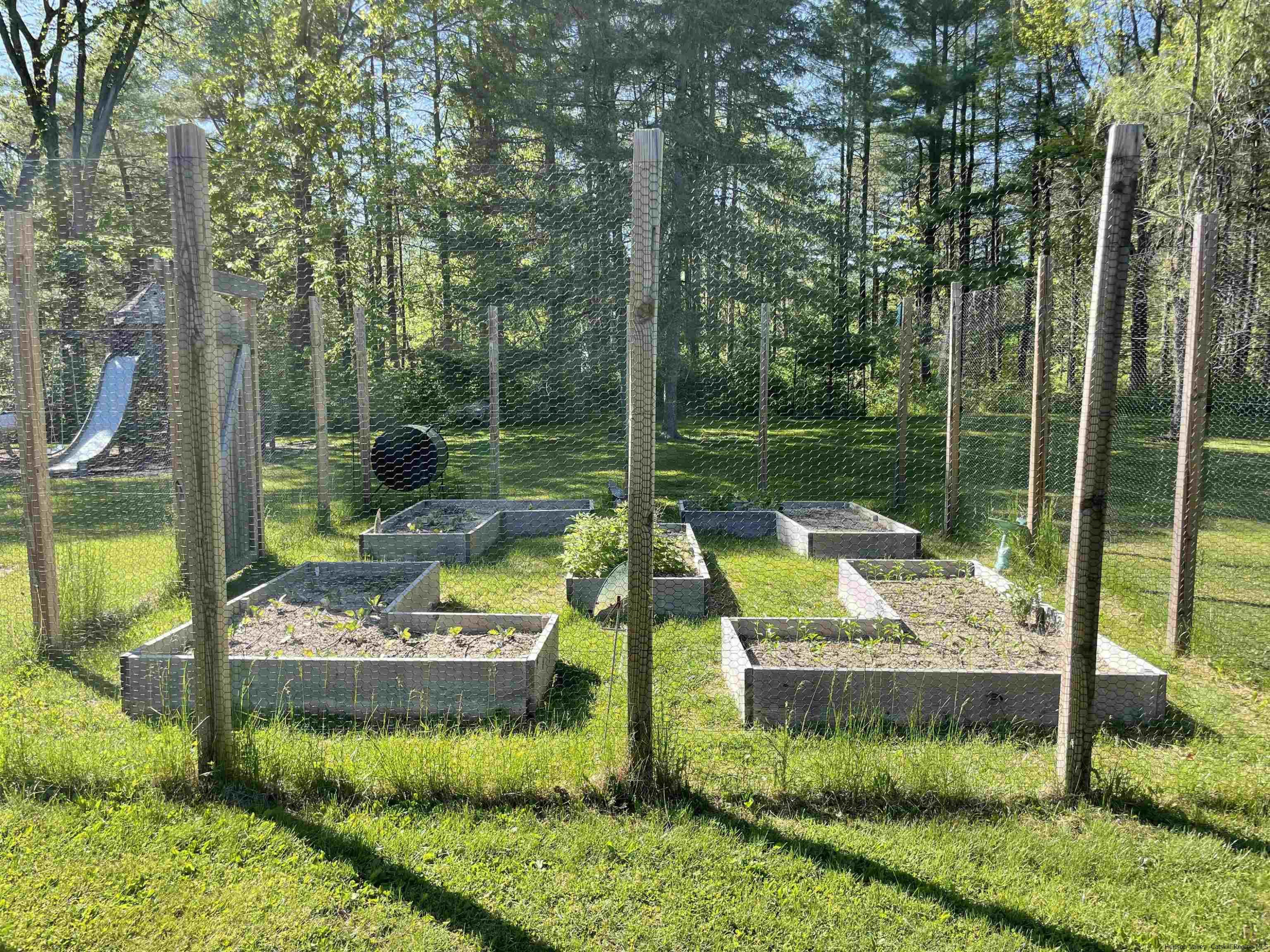 1 High Ridge Road, Unit KLEINKILL DR New Paltz, NY 12561 - Photo 30 of 30 a view of a garden with a fountain