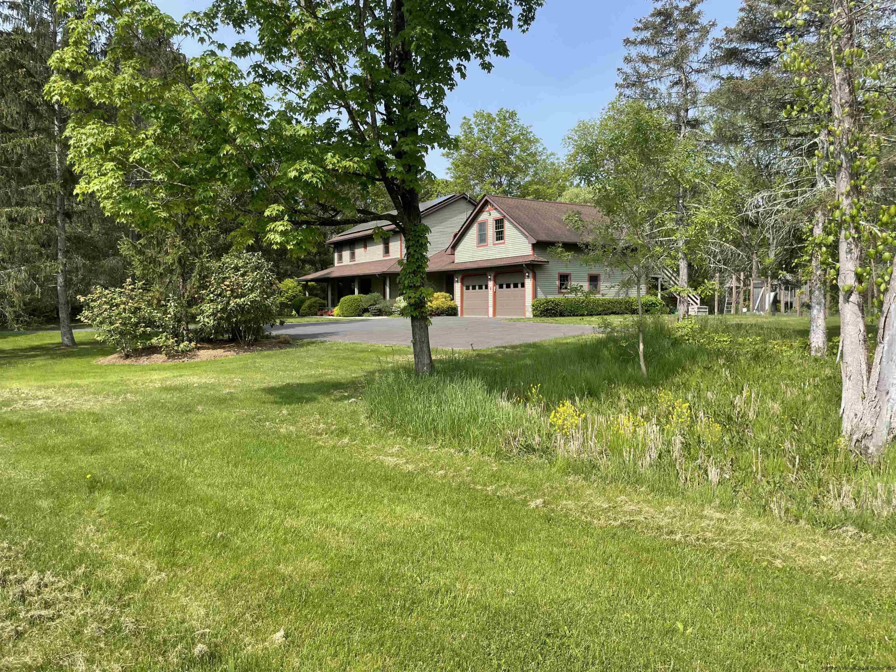 1 High Ridge Road, Unit KLEINKILL DR New Paltz, NY 12561 - Photo 4 of 30 a front view of a house with yard and green space