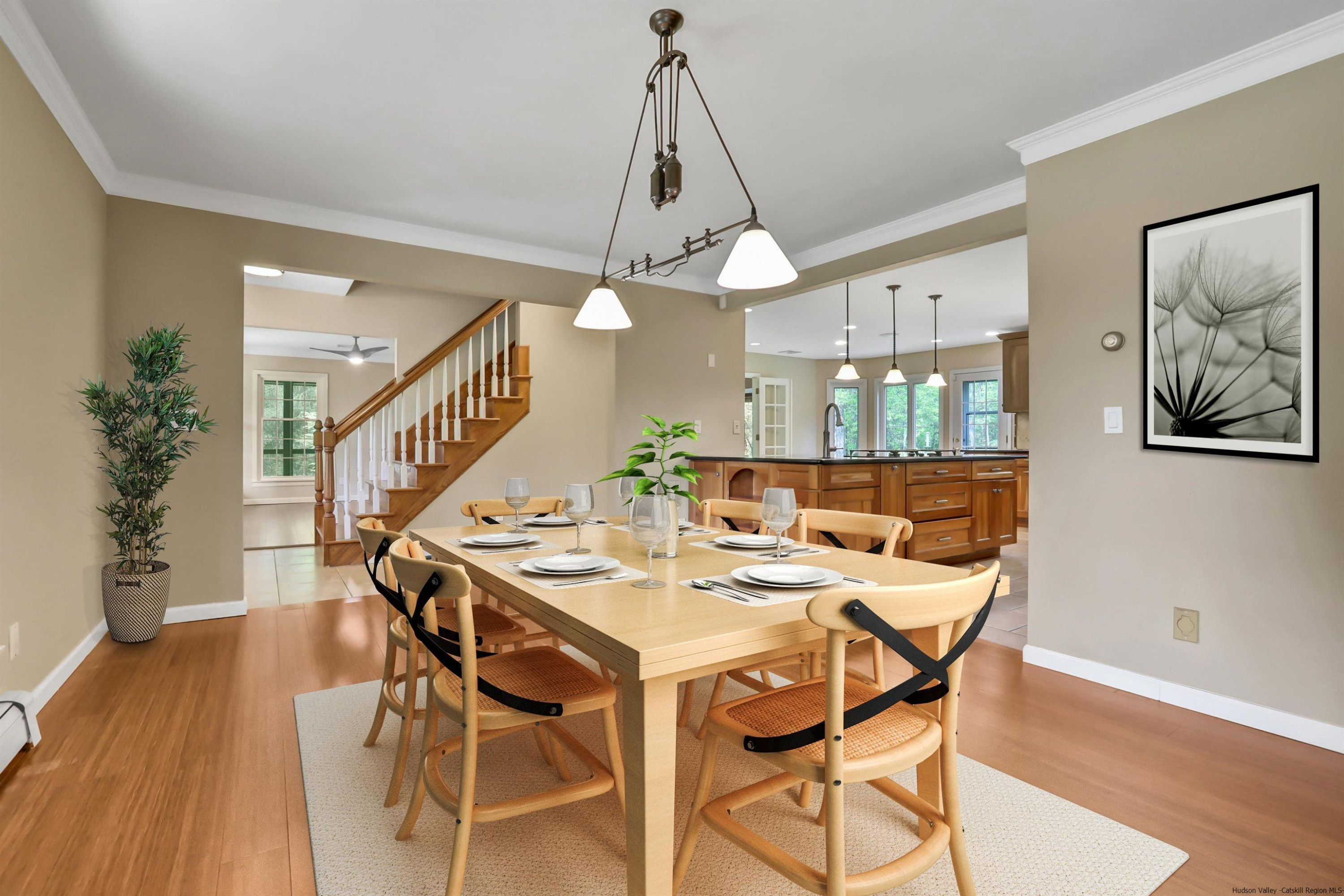 1 High Ridge Road, Unit KLEINKILL DR New Paltz, NY 12561 - Photo 8 of 30 a view of a dining room with furniture and wooden floor
