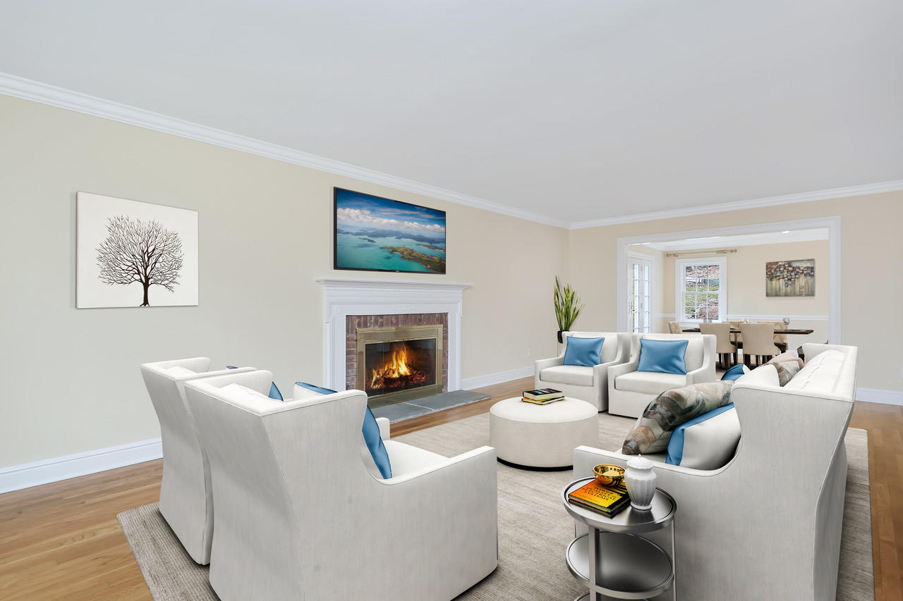 62 Salem Road New Canaan, CT 06840 - Photo 3 of 17 a living room with furniture a fireplace and a window