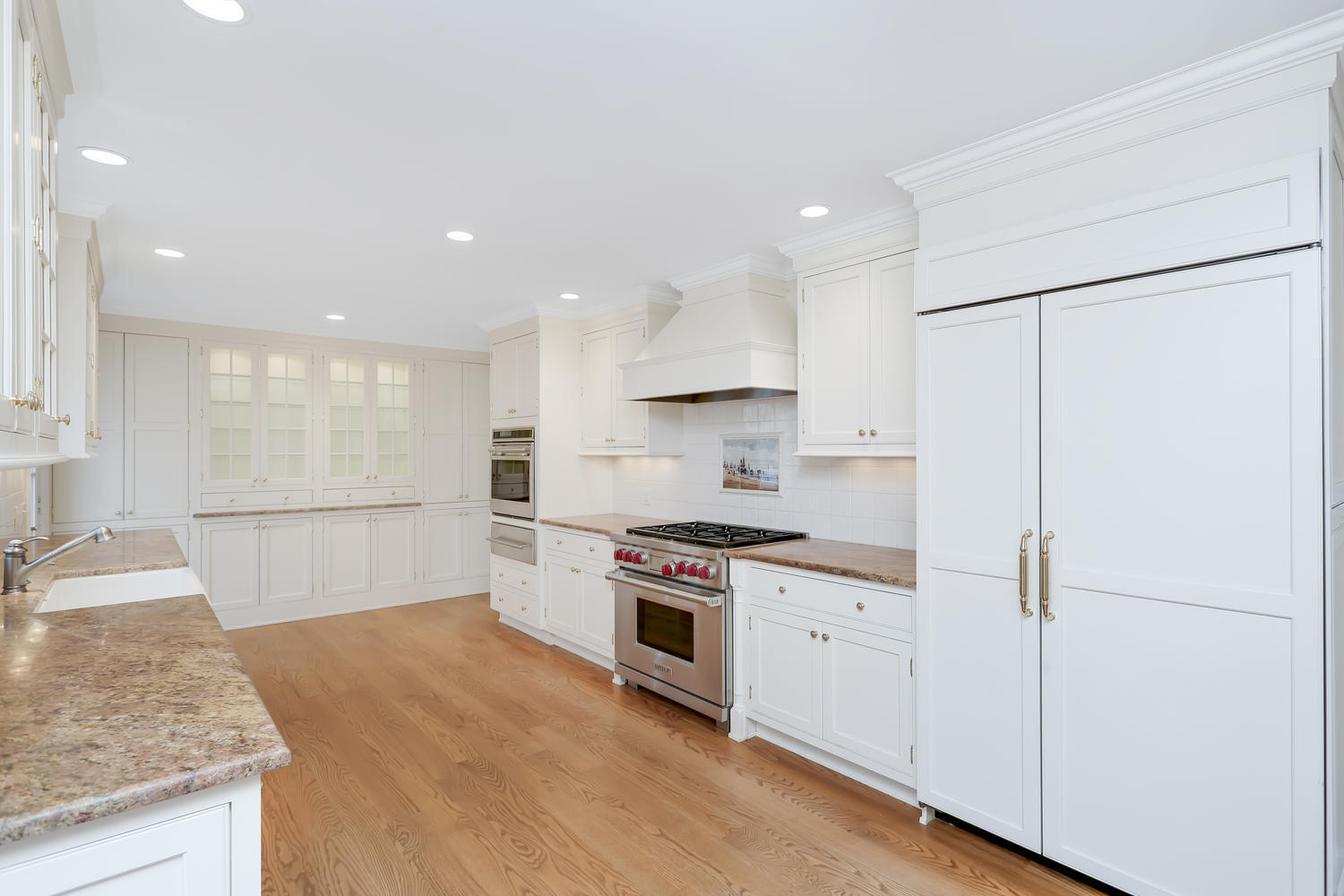 62 Salem Road New Canaan, CT 06840 - Photo 5 of 17 a large kitchen with stainless steel appliances granite countertop a stove a sink and a refrigerator