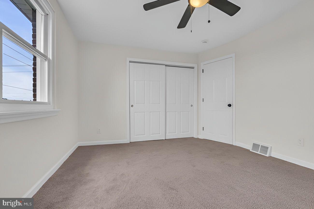 1300 East Sharpnack Street Philadelphia, PA 19150 - Photo 13 of 31 a view of room and chandelier fan