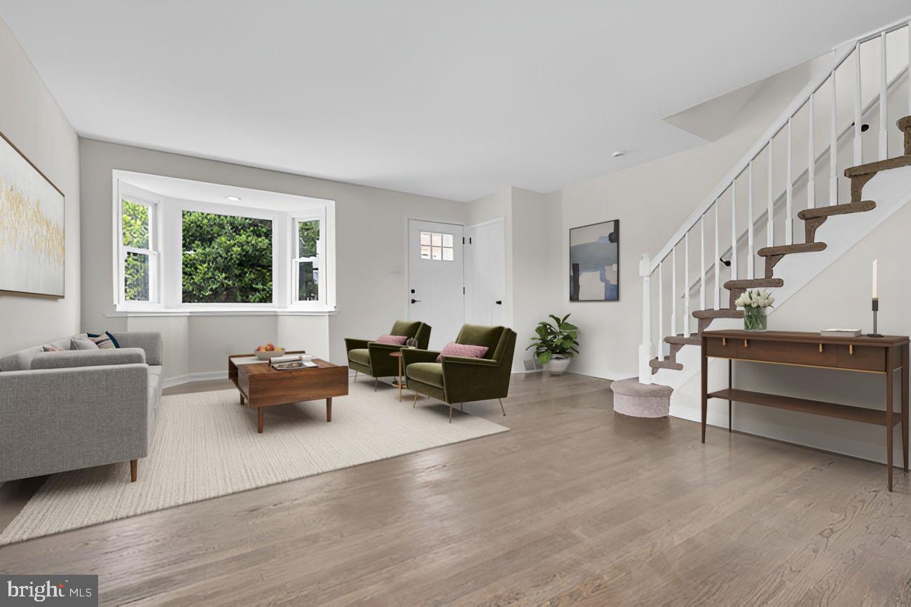 1300 East Sharpnack Street Philadelphia, PA 19150 - Photo 2 of 31 a living room with furniture and wooden floor