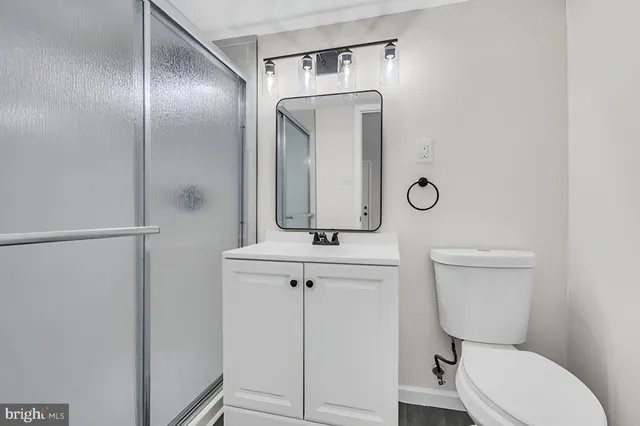 a living room with couch and window