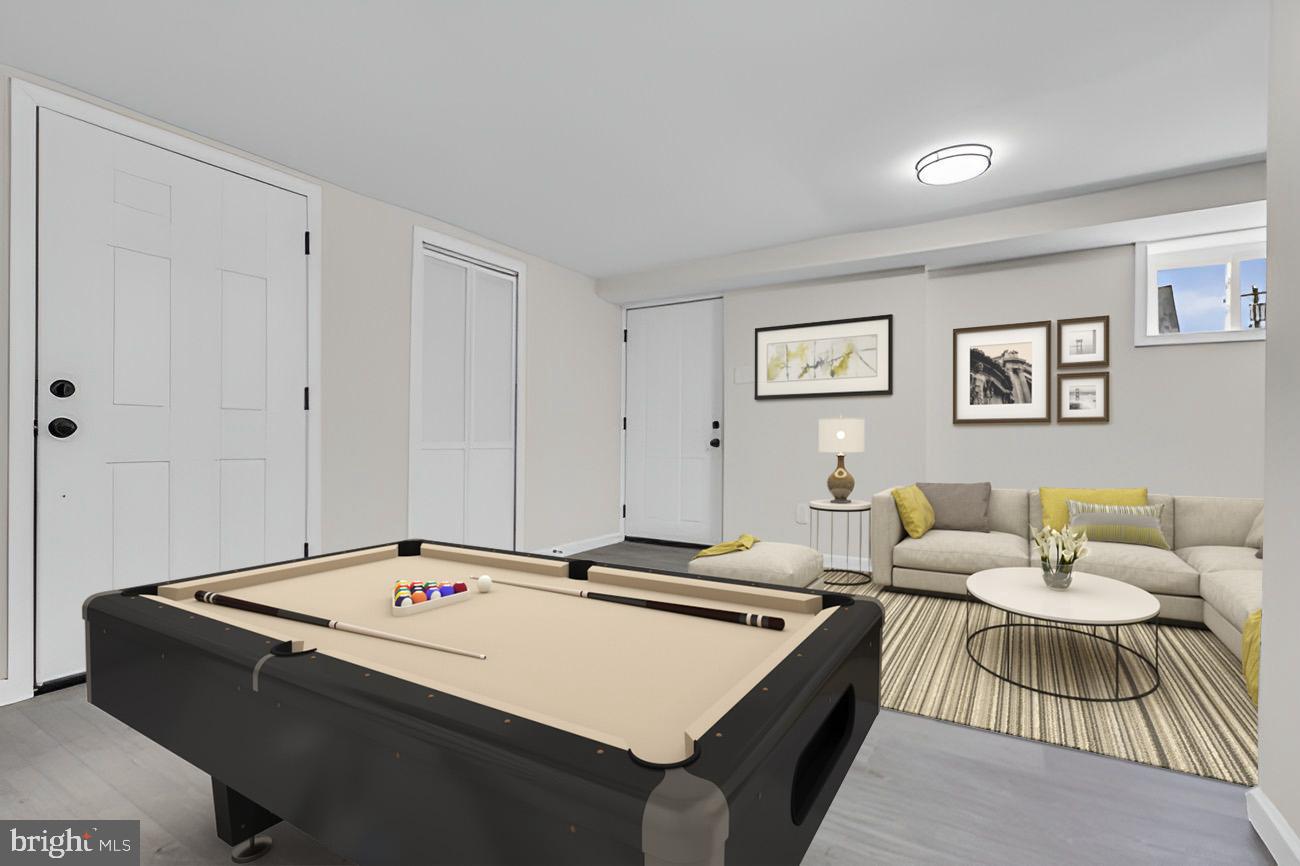 1300 East Sharpnack Street Philadelphia, PA 19150 - Photo 24 of 31 a living room with couch and window