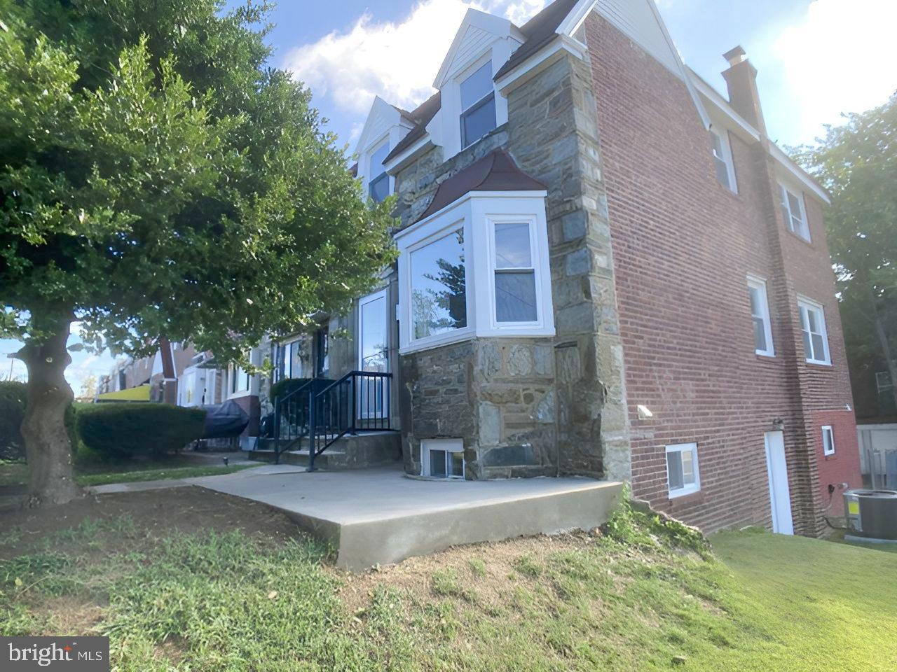 1300 East Sharpnack Street Philadelphia, PA 19150 - Photo 31 of 31 a view of a building with a garden