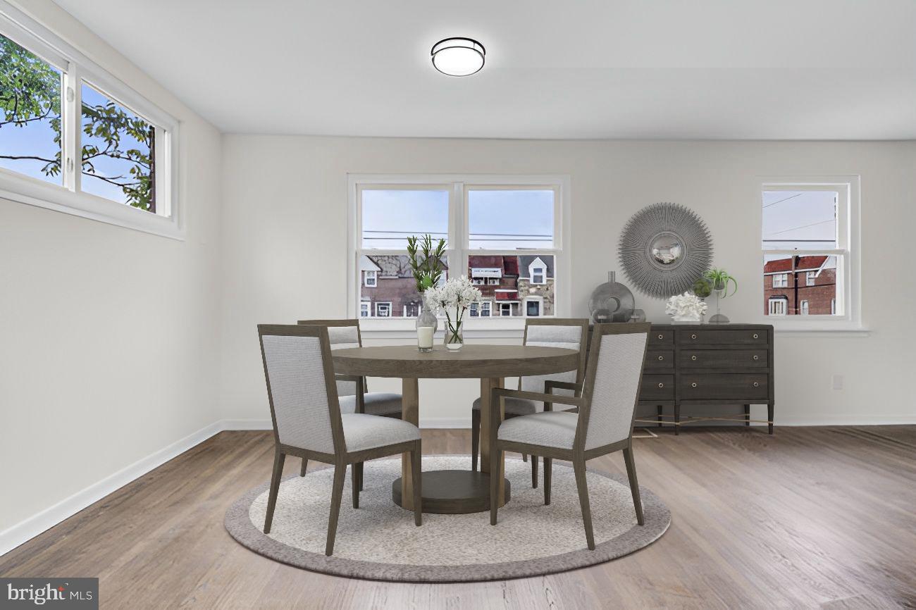 1300 East Sharpnack Street Philadelphia, PA 19150 - Photo 9 of 31 a dining room with furniture and window