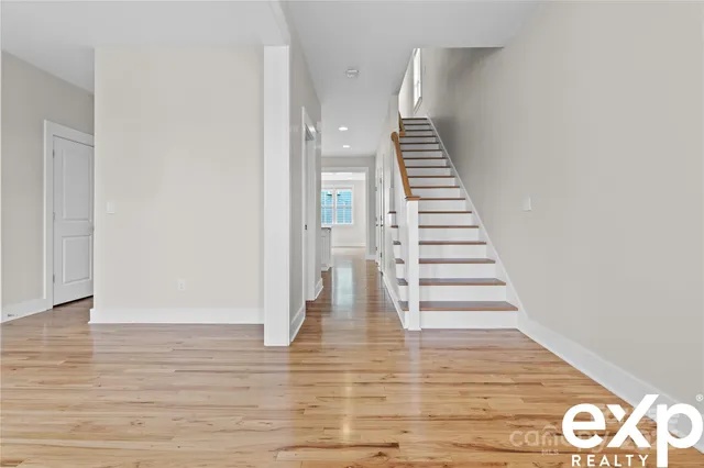 a view of entryway with wooden floor