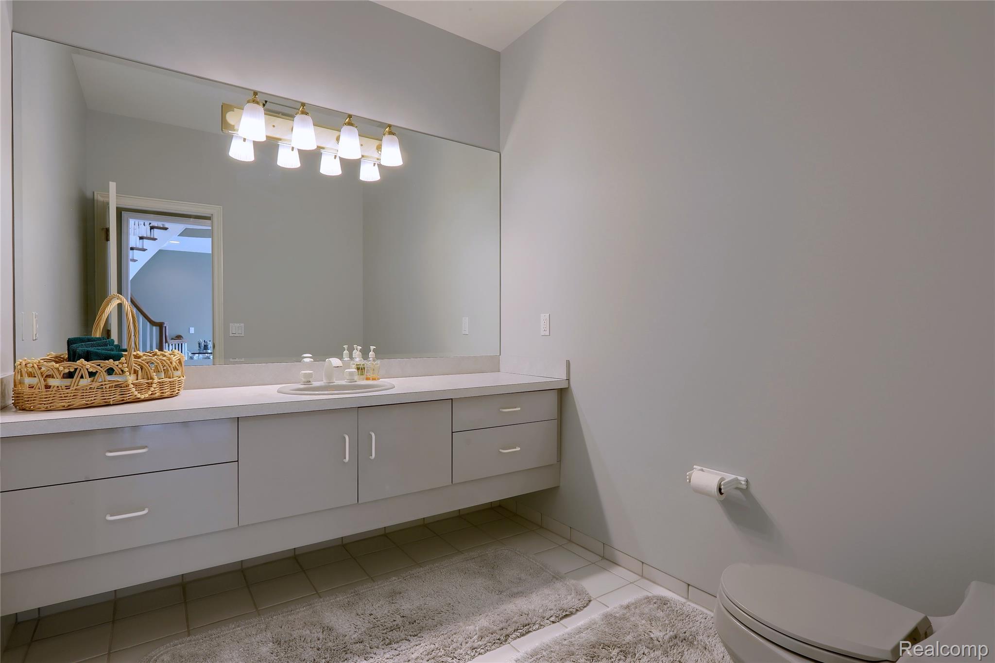 1721 Archers Pointe Rochester, MI 48306 - Photo 26 of 58 Bathroom with vanity and light tile patterned floors