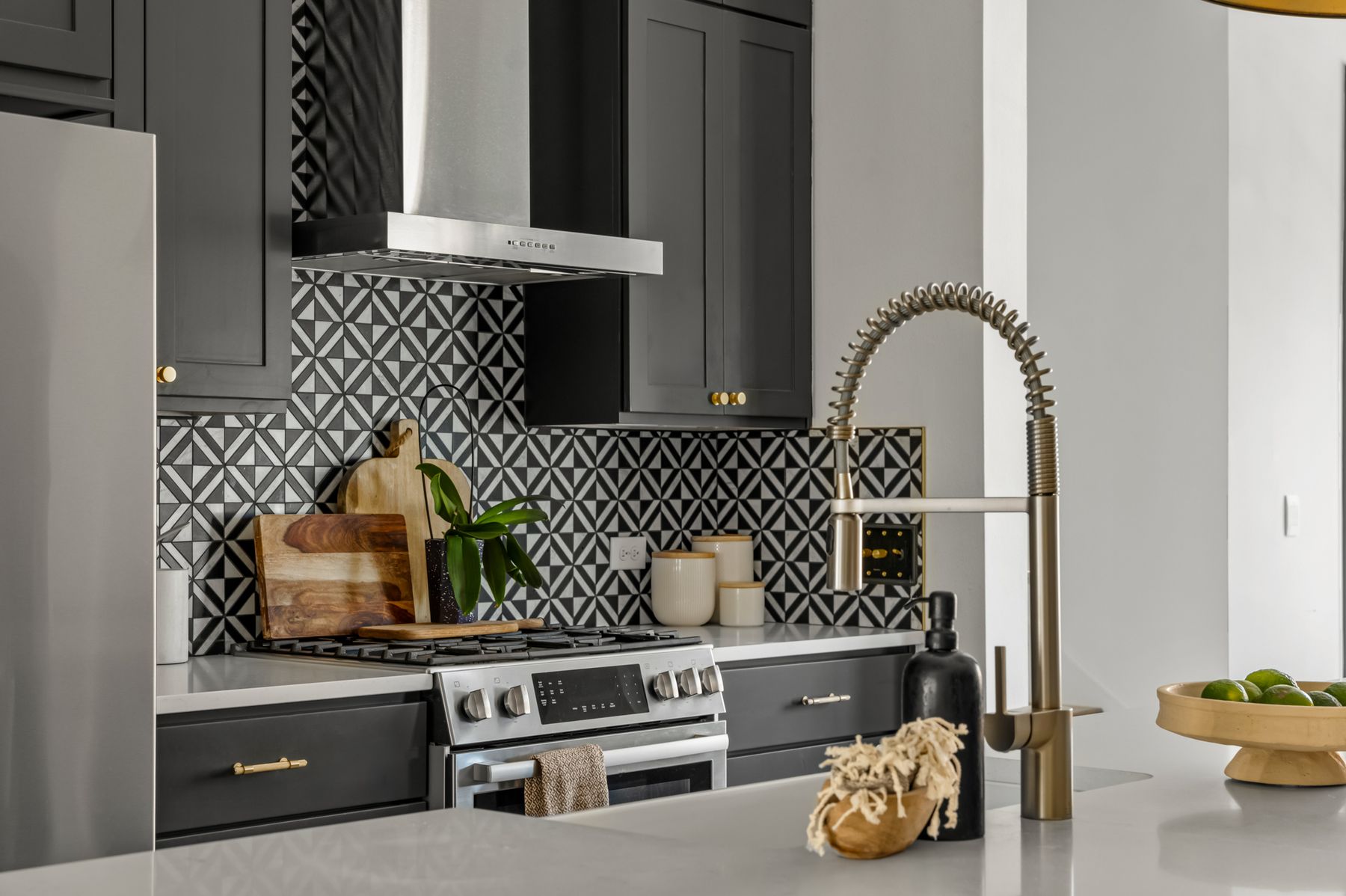 a kitchen with a stove and a cabinet