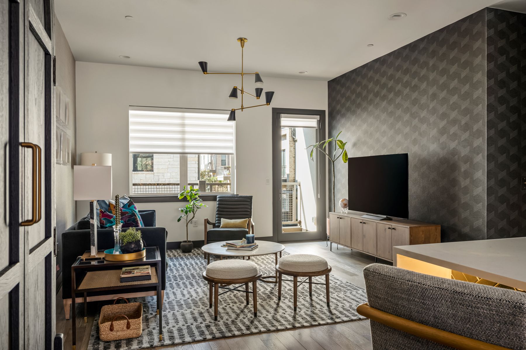 4507 Unity Circle Austin, TX 78731 - Photo 11 of 39 a living room with furniture and a flat screen tv