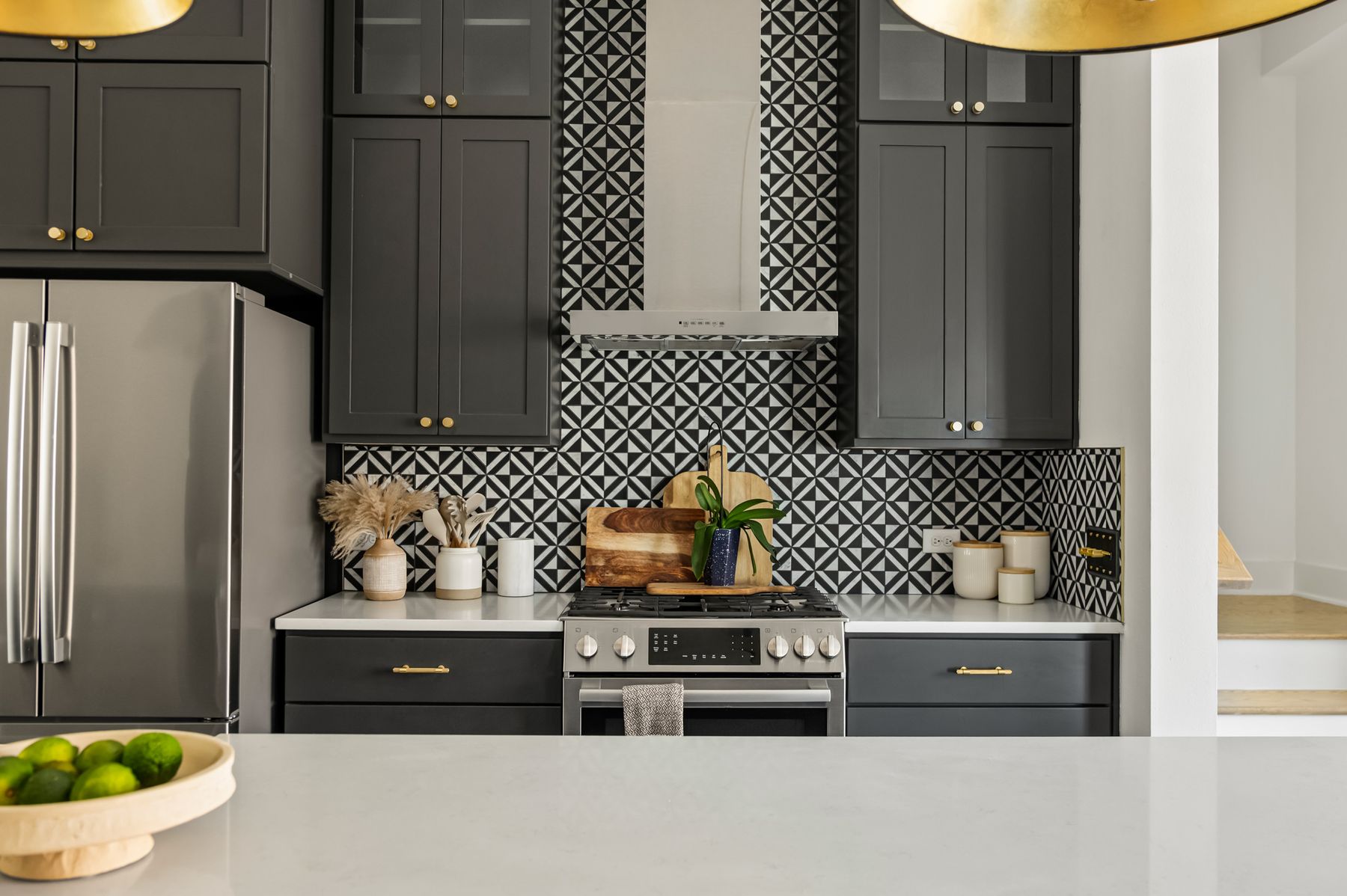 4507 Unity Circle Austin, TX 78731 - Photo 16 of 39 a room with a refrigerator and a wooden floor