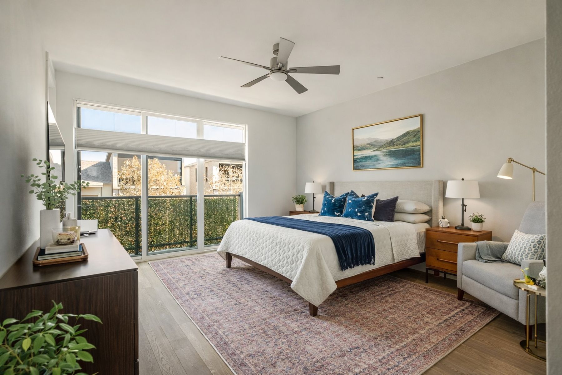 4507 Unity Circle Austin, TX 78731 - Photo 24 of 39 a spacious bedroom with a bed and a large window