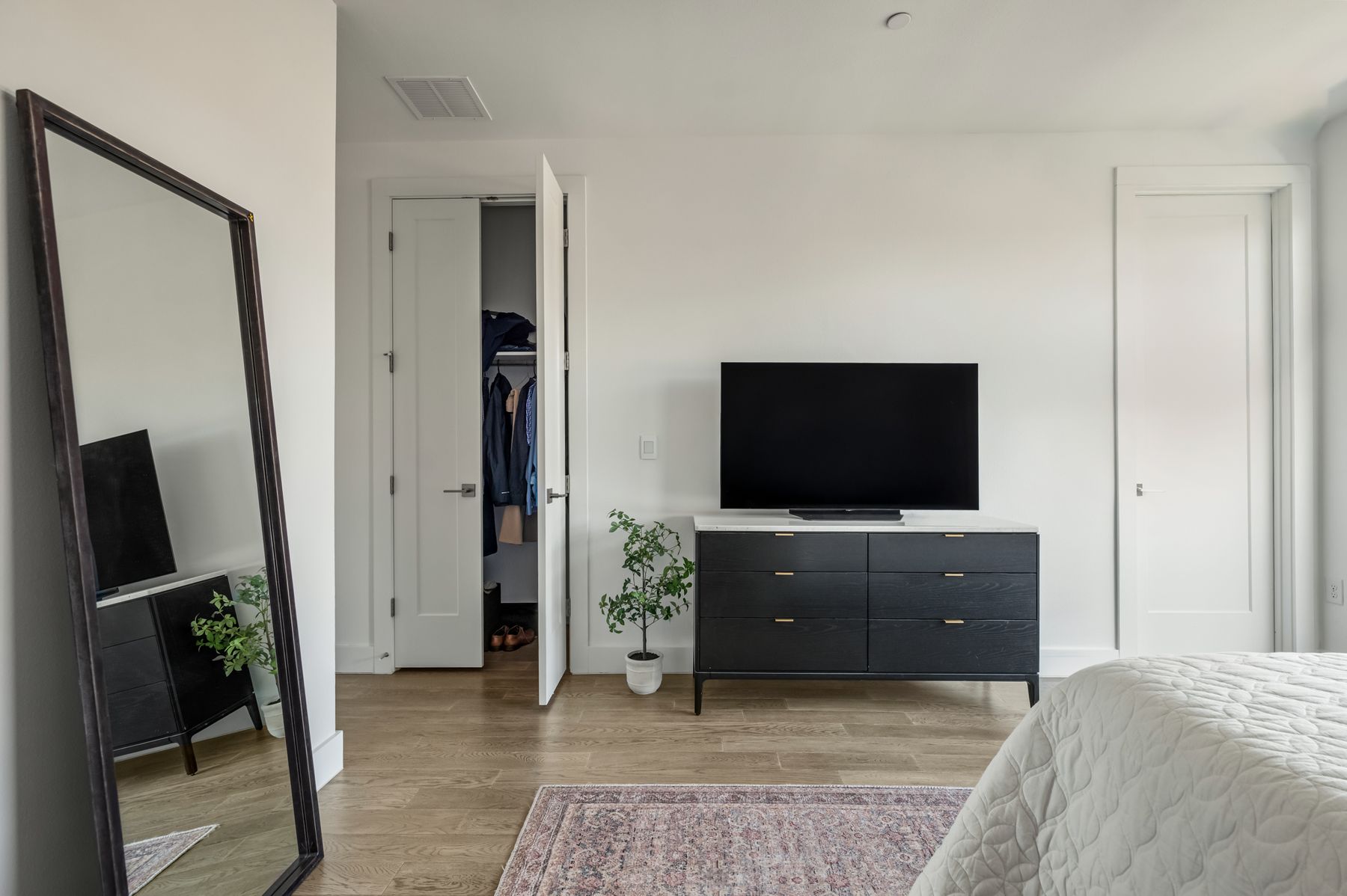 4507 Unity Circle Austin, TX 78731 - Photo 25 of 39 a living room with furniture and a flat screen tv