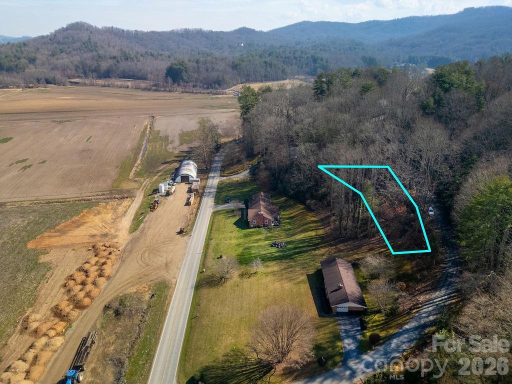 Lot 4 Middlemount Road Pisgah Forest, NC 28768 - Photo 9 of 12 a view of a lake in middle of the town