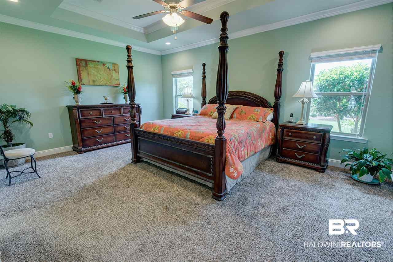 7023 Rocky Rd Loop Gulf Shores, AL 36542 - Photo 26 of 34 Master Bedroom