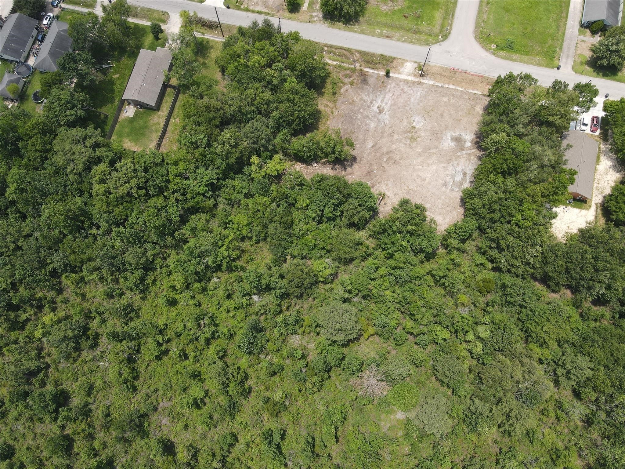 Tbd Norwich Street Houston, TX 77028 - Photo 4 of 6 an aerial view of a house with yard and outdoor space