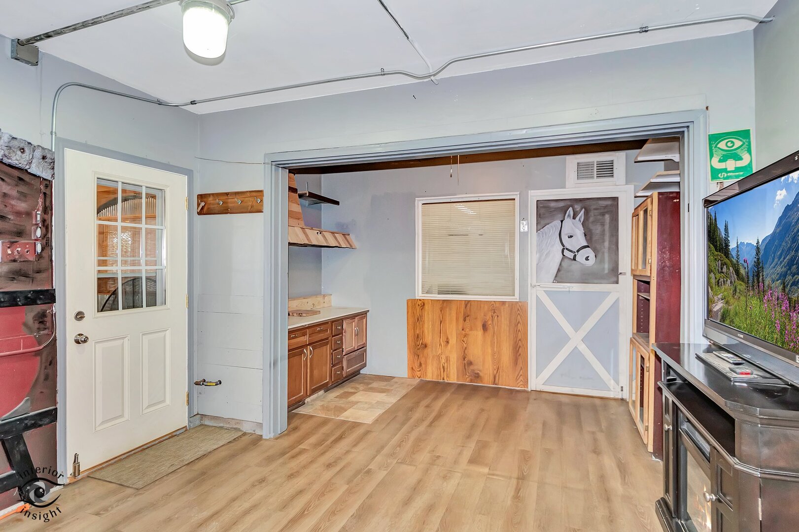 2434 North 7000 Road West Bonfield, IL 60913 - Photo 14 of 36 wooden floor in an empty room with a window and wooden floor