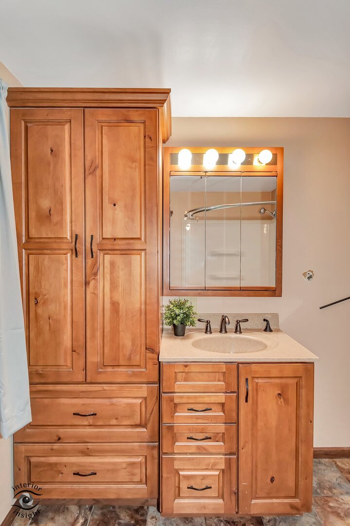 2434 North 7000 Road West Bonfield, IL 60913 - Photo 19 of 36 a bathroom with a sink and a mirror