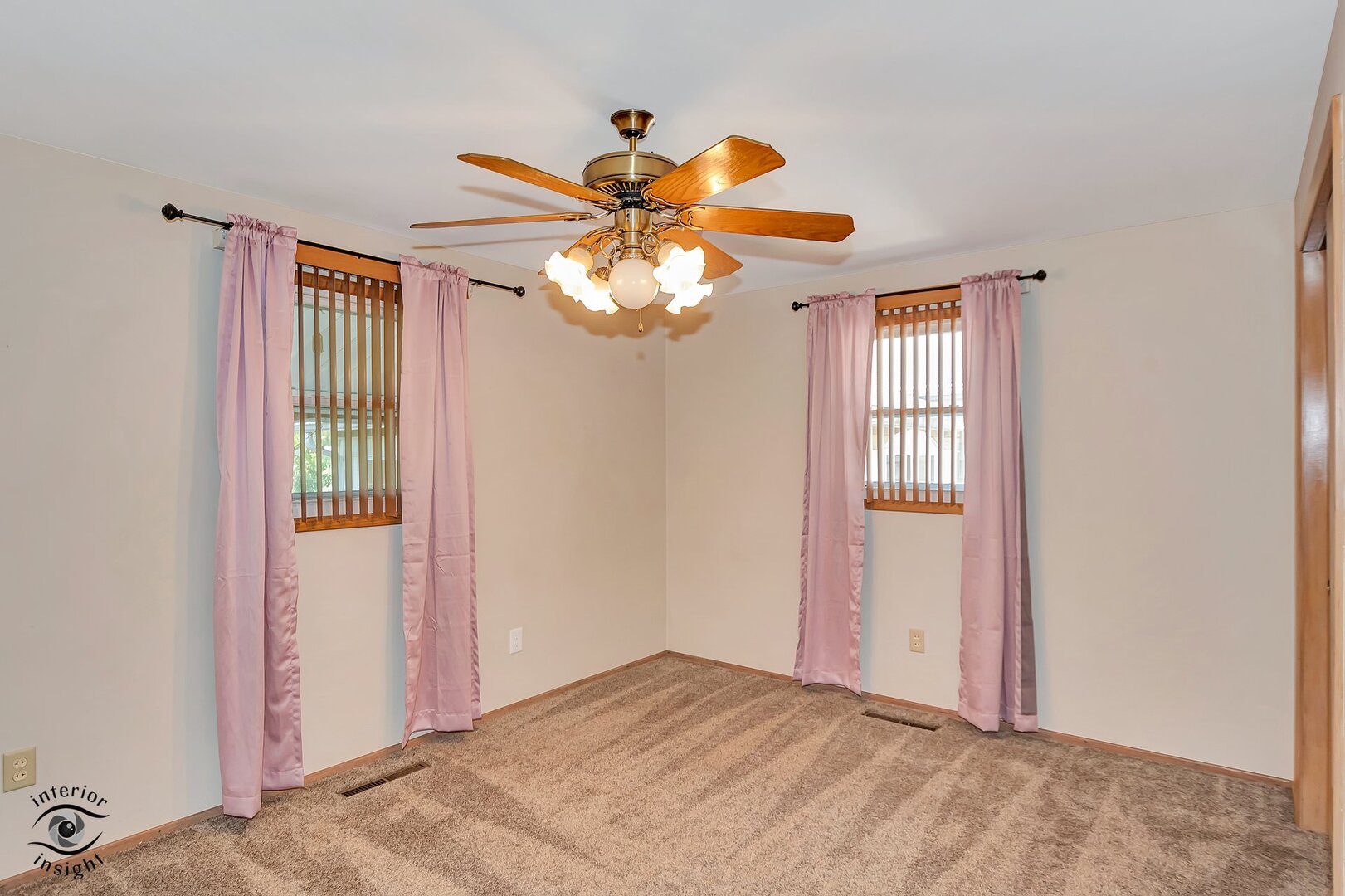 2434 North 7000 Road West Bonfield, IL 60913 - Photo 21 of 36 a view of a livingroom with a chandelier fan