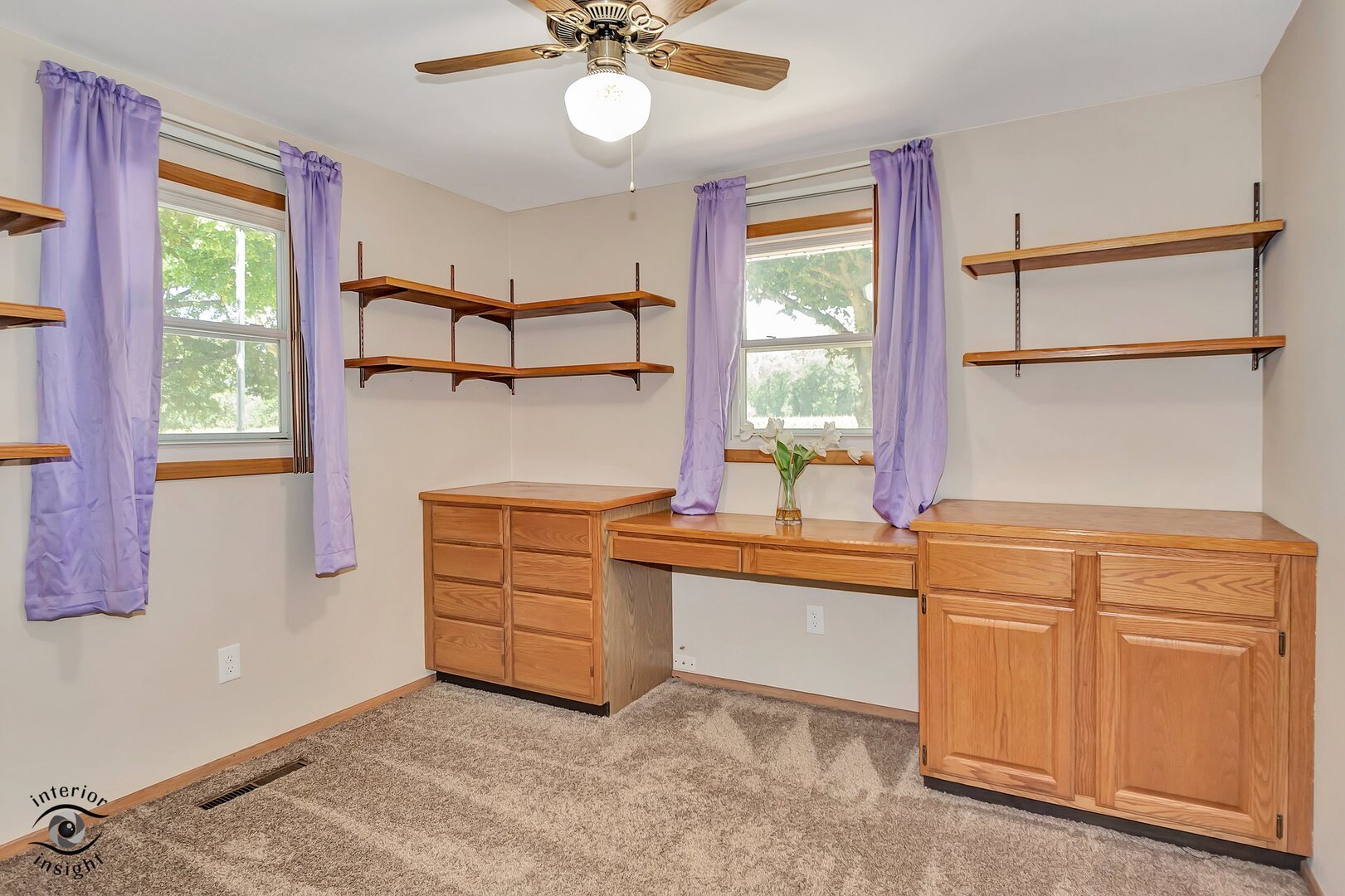 2434 North 7000 Road West Bonfield, IL 60913 - Photo 22 of 36 a kitchen with granite countertop cabinets stainless steel appliances and a large window