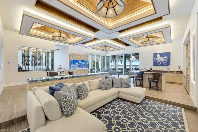 a living room with furniture and a rug