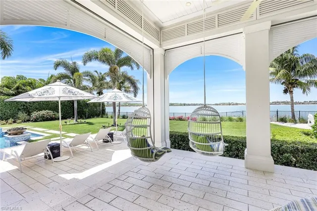 a view of swimming pool with a patio