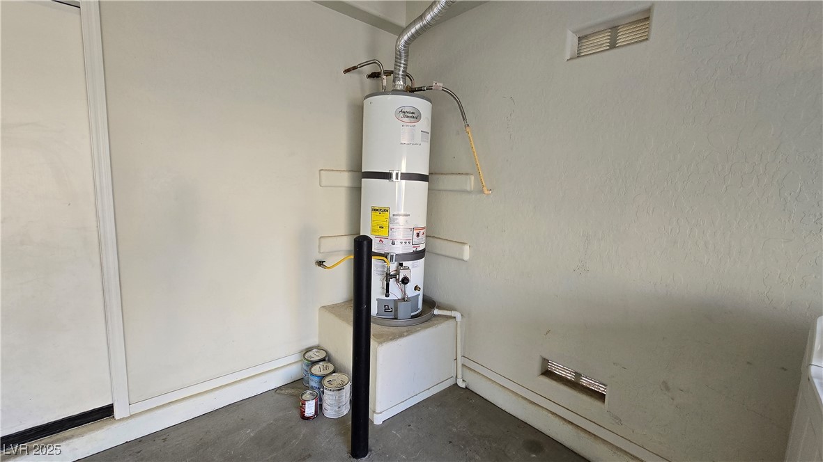 2737 Rimbaud Street Henderson, NV 89044 - Photo 19 of 49 Utility room with water heater