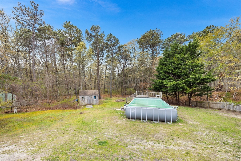 239 Upper County Road South Dennis, MA 02660 - Photo 32 of 38 a view of a swimming pool and outdoor space