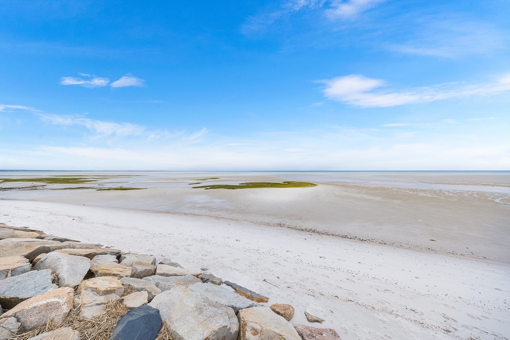239 Upper County Road South Dennis, MA 02660 - Photo 4 of 38 a view of an ocean and beach