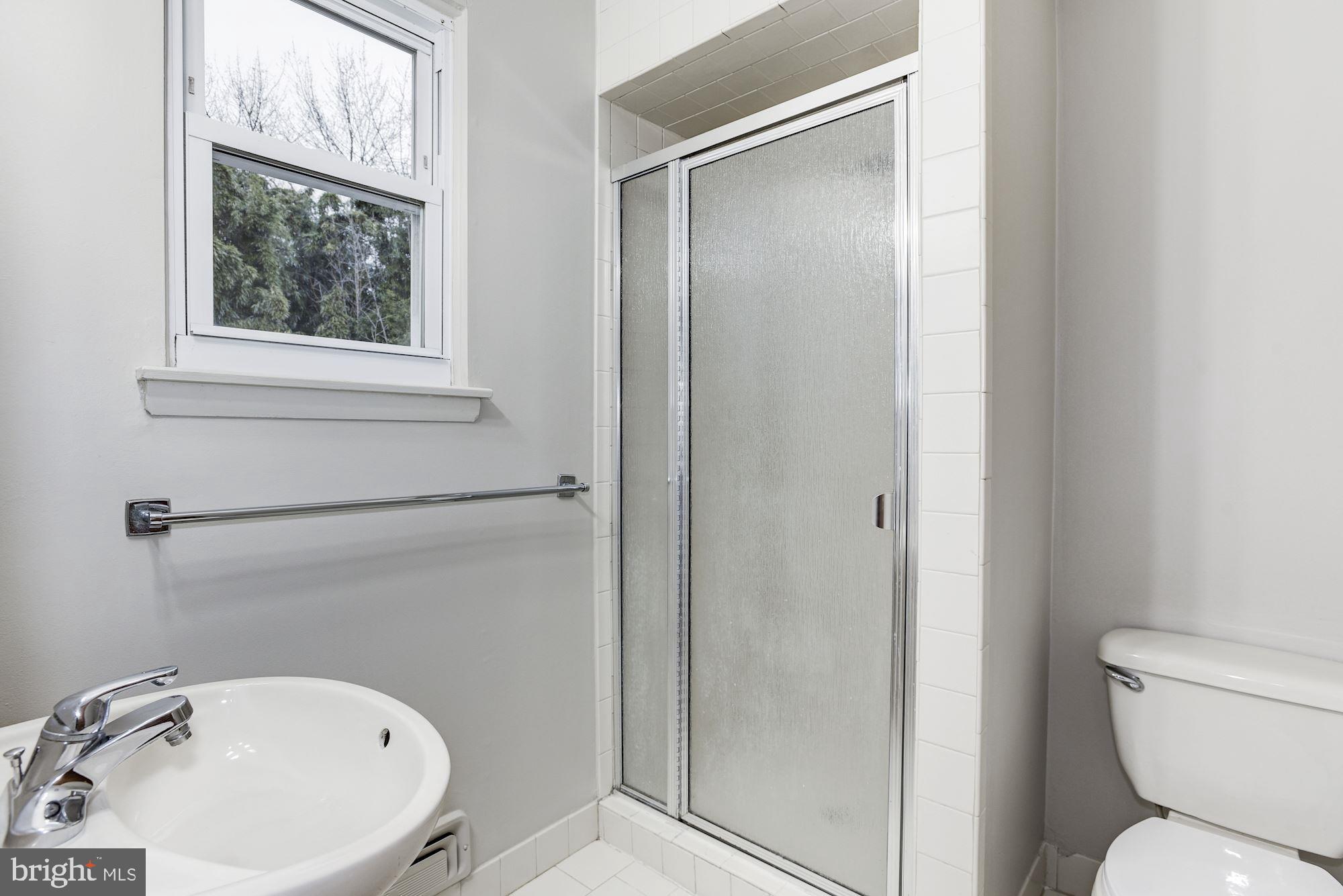 211 Winston Road Mount Laurel, NJ 08054 - Photo 18 of 32 a bathroom with a sink and a mirror