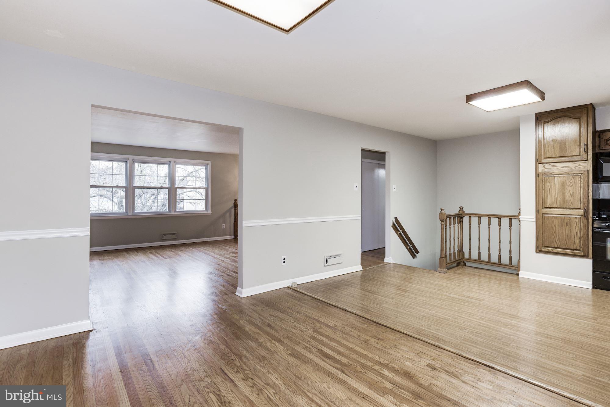 211 Winston Road Mount Laurel, NJ 08054 - Photo 10 of 32 an empty room with wooden floor and windows