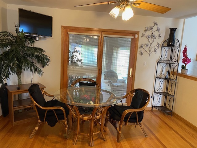 Undisclosed Address Olympia Fields, IL 60461 - Photo 14 of 31 a dining room with furniture and wooden floor