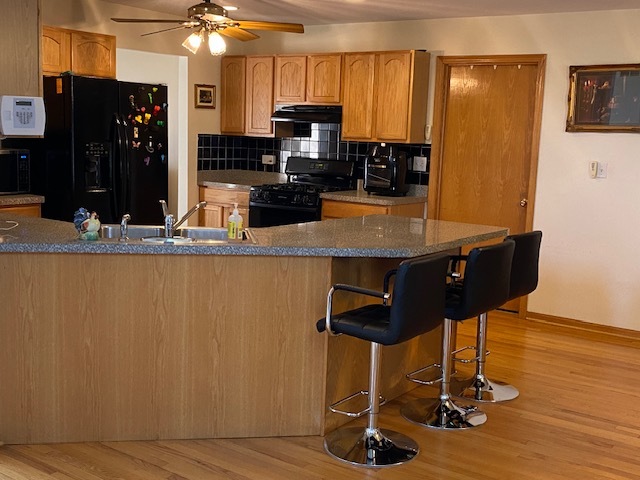 Undisclosed Address Olympia Fields, IL 60461 - Photo 15 of 31 a room with table chairs and mirrors