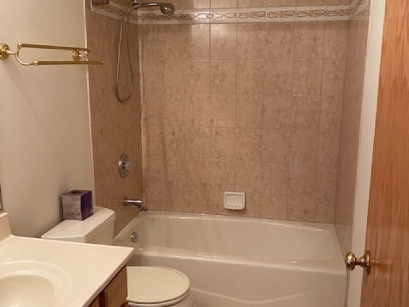 Undisclosed Address Olympia Fields, IL 60461 - Photo 21 of 31 a bathroom with a sink and a bathtub