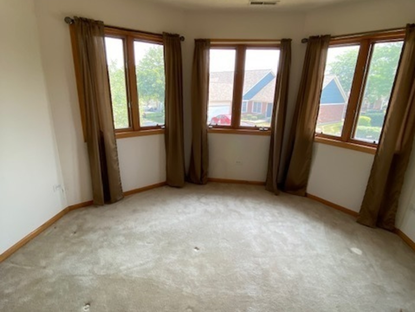 Undisclosed Address Olympia Fields, IL 60461 - Photo 22 of 31 a view of an empty room with a window