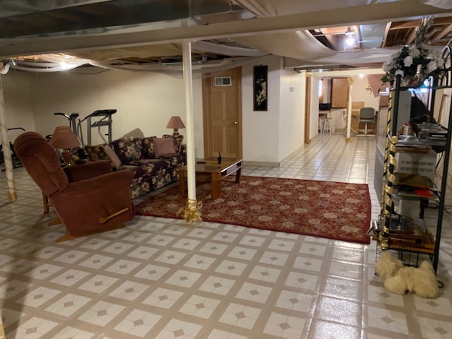 Undisclosed Address Olympia Fields, IL 60461 - Photo 28 of 31 a living room with furniture and a flat screen tv