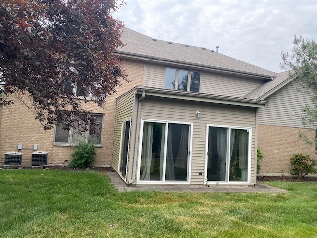 Undisclosed Address Olympia Fields, IL 60461 - Photo 31 of 31 front view of a house with a yard