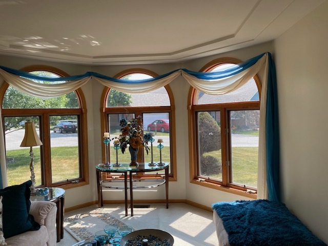 Undisclosed Address Olympia Fields, IL 60461 - Photo 5 of 31 a very nice looking room with a large window and a table